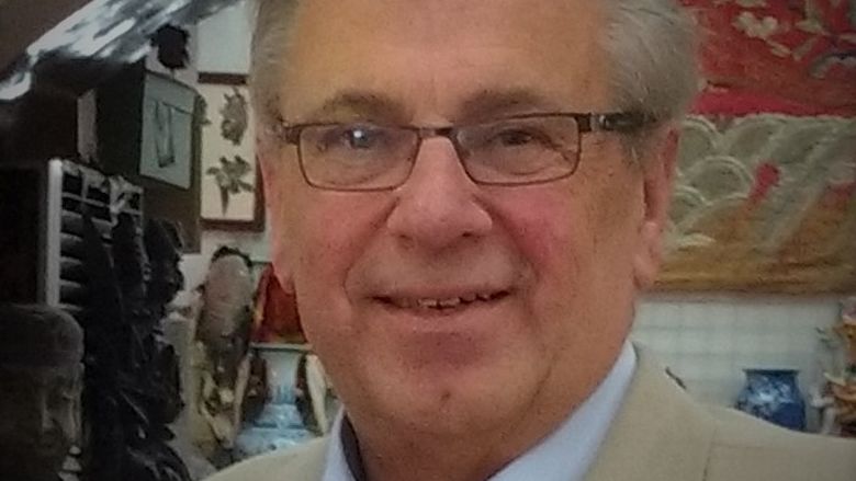 close up photo of man in blazer