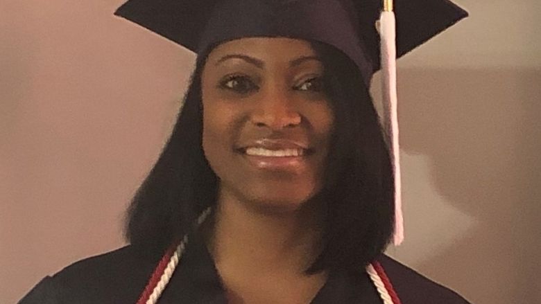 head shot of graduate in cap