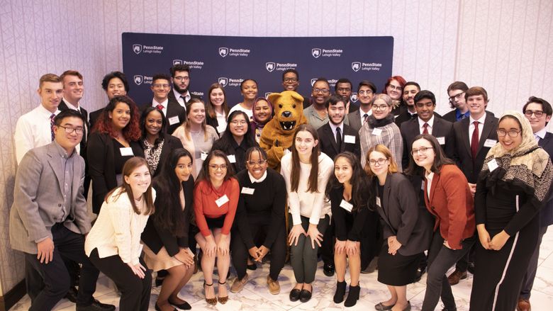 group of students with nittany lion mascot