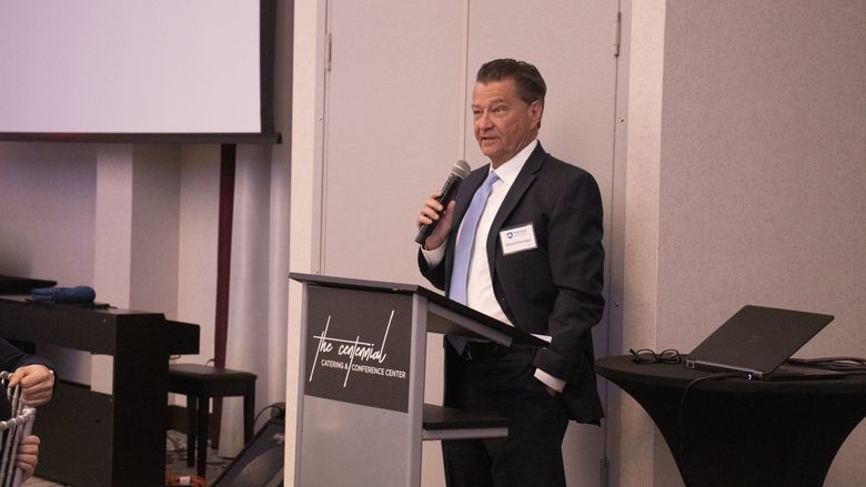Man speaking at event