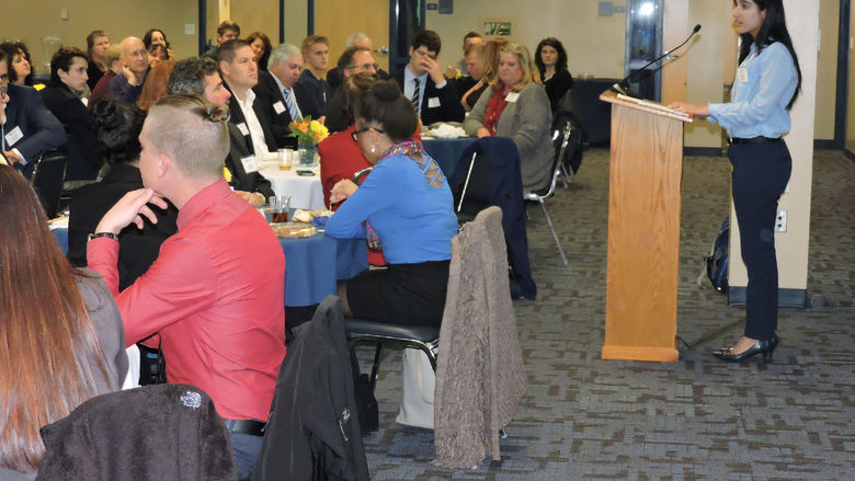 Naseeba speaking at Scholarship Dinner