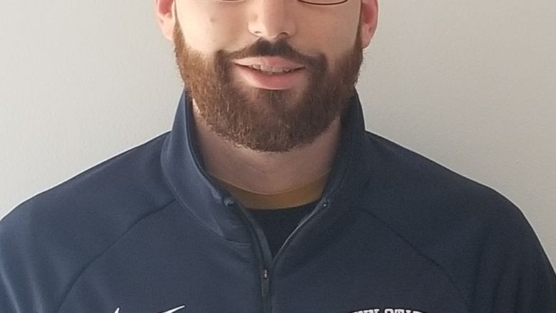 head shot of soccer coach