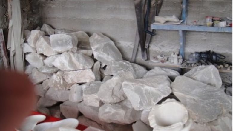 A pile of rough white alabaster stone