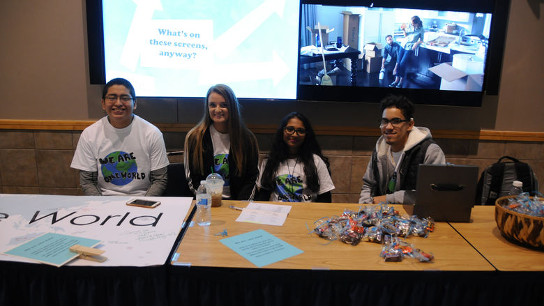 Students staffing a table