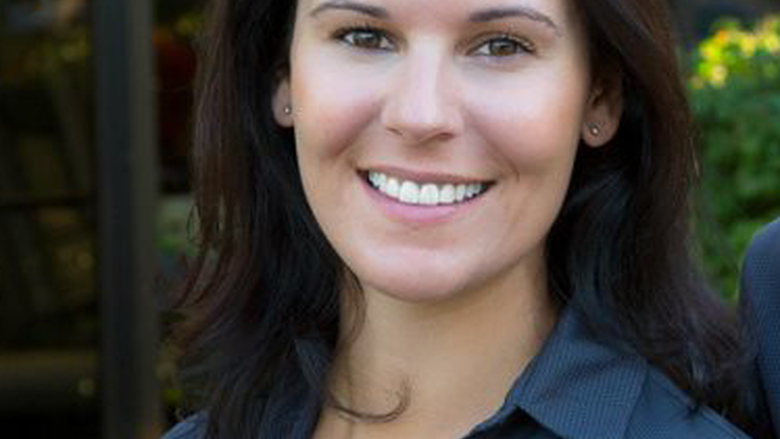 head shot of woman with brown hair