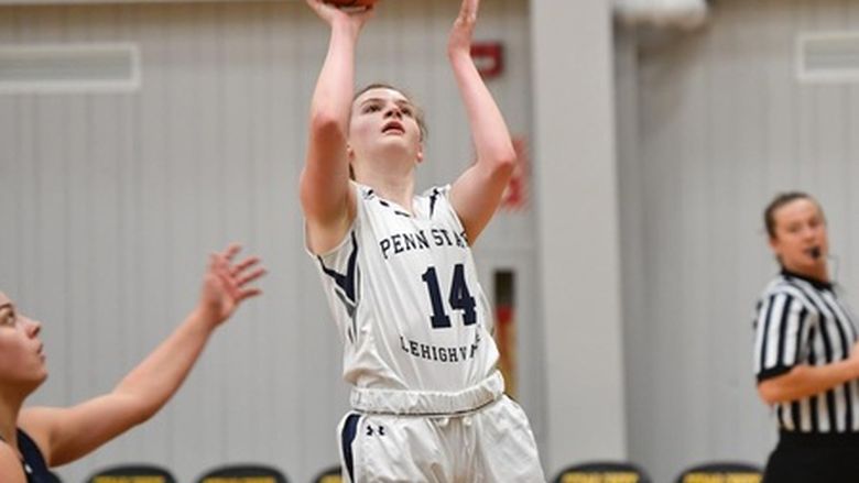 women basketball player shooting