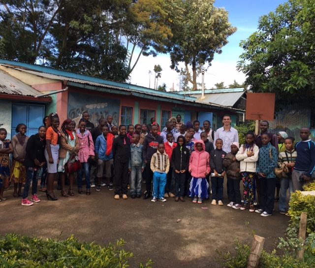 Nick Miller poses with group in Nairobi