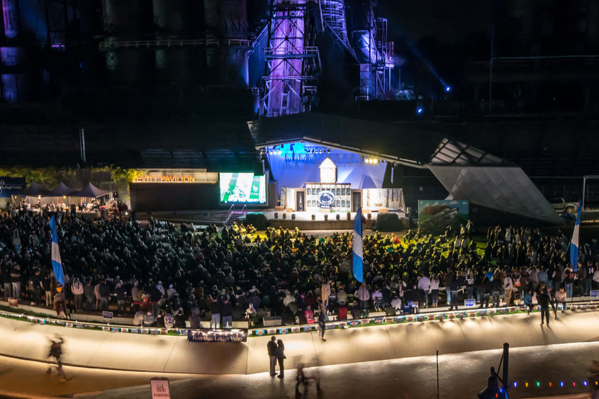 Levitt Pavilion at ArtsQuest full of people watching a game on big screen