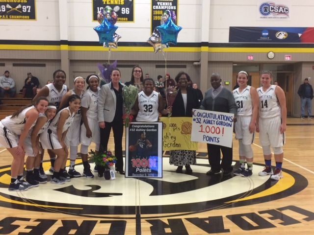 Ashley Gordon, her coach, teammates and parents