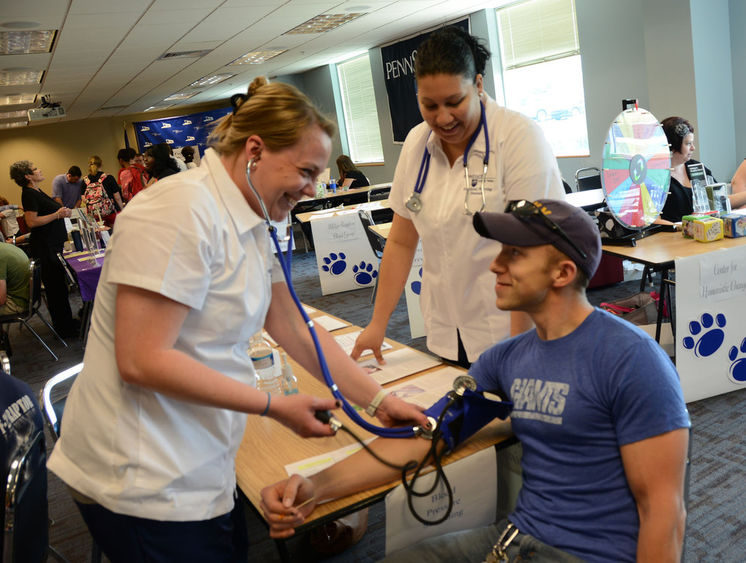 a person getting blood pressure taken