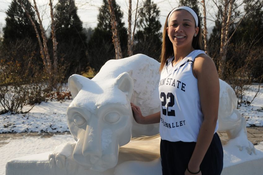 Andrea Watkins in front of lion shrine