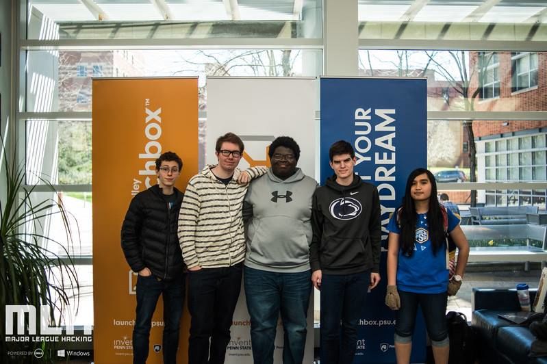 students standing in front of banners