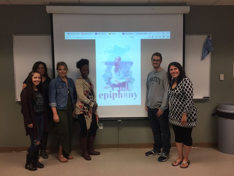 Group pose in classroom