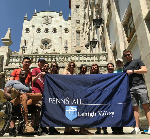 Group of students with PSU-LV banner in Mexico