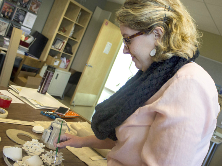 a woman painting