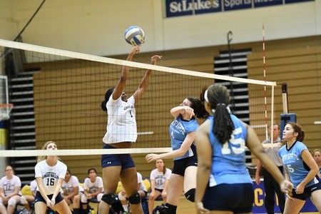 volleyball player jumping to net