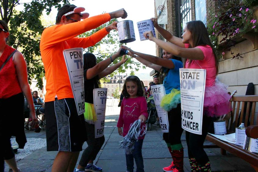 A group of students canning for THON A group of students canning for THON