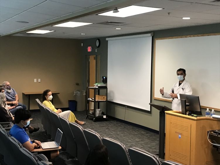 Dr. Sean Pandey gives presentation.
