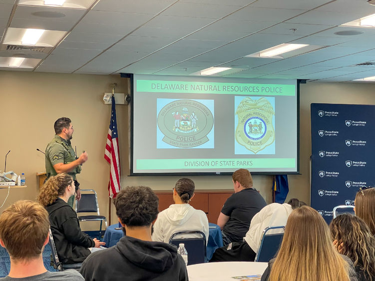 Officers from Delaware Natural Resources Police give presentation to interested CRIMJ students