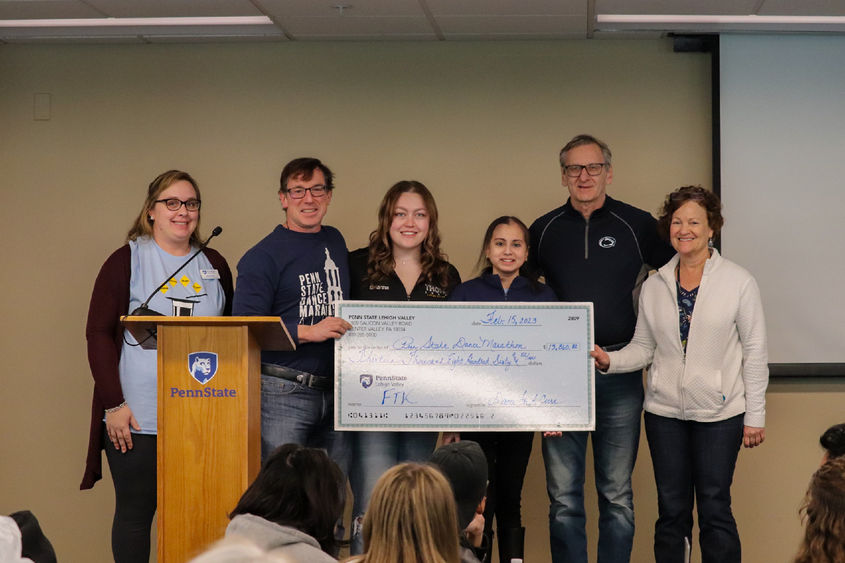 Dance for a Cure presenting check to PSU-LV Benefitting THON's Executive board 