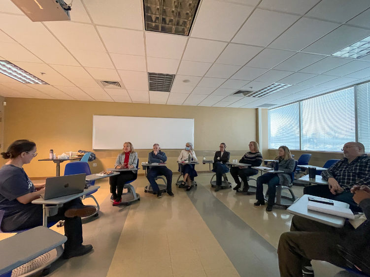 PSU-LV Faculty and Staff sitting in brainstorm circle