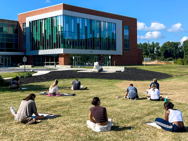 Students Outside Drawing PSU-LV's Expansion