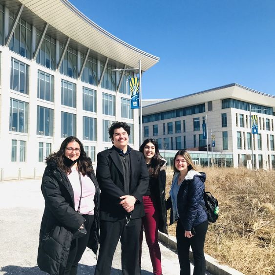 Students pose for picture at conference