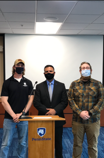 Penn State student veterans pose with Rocco Zegalia.