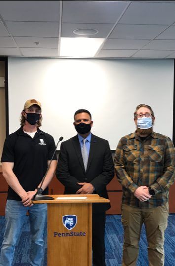 Penn State student veterans pose with Rocco Zegalia. 