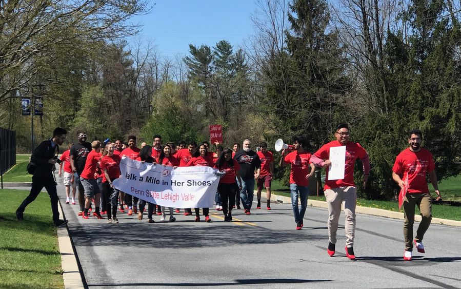 group marching in red shirts